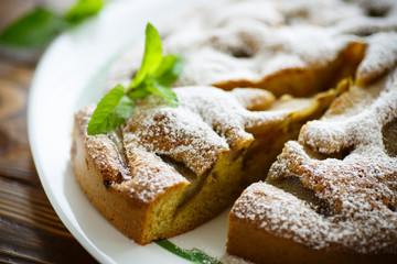 cake with pears in powdered sugar