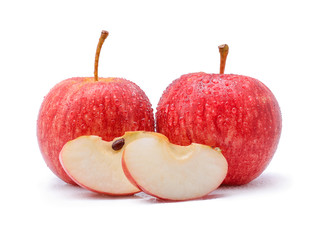 gala apples with drops of water on white background.