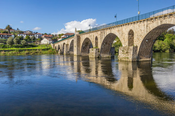 Fototapeta premium Historical roman bridge in Ponte da Barca