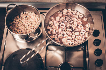 Cooking squids in pan