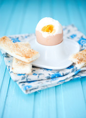 Boiled egg with wheat croutons
