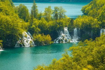 Beautiful landscape, waterfall and clear green water in the Plitvice Lakes National Park in Croatia, beautiful world