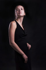 Young woman in black dress