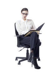 businesswoman writing on her documents