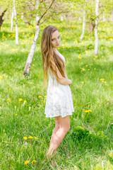 Fototapeta premium portrait of happy girl on nature in summer
