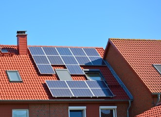 Fototapeta premium Solar energy panels on roof of house