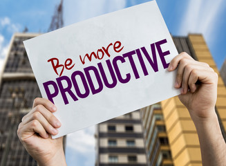 Be More Productive placard with urban background