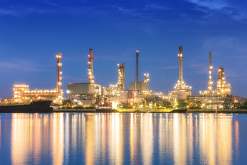 Oil refinery plant at dusk.