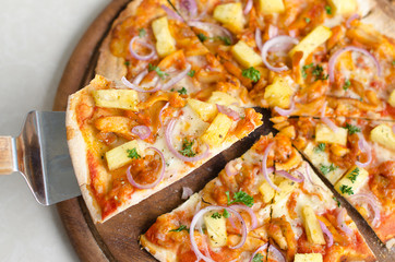 Hawaiian Chicken BBQ Italian Pizza on wood dish 