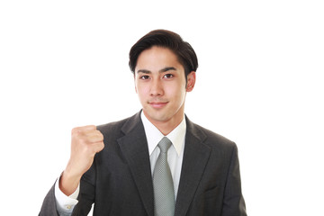 ガッツポーズのビジネスマン