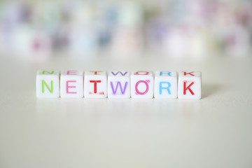 close up image, NETWORK word written on plastic block