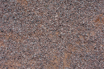 a surface of small stones and gravel 34