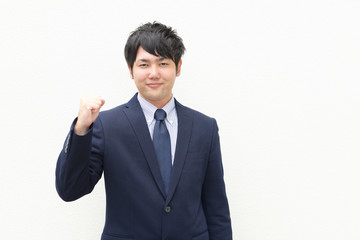 ガッツポーズのビジネスマン