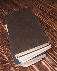 Old books on wood desk
