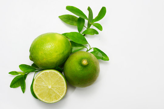 lime fruits on white background