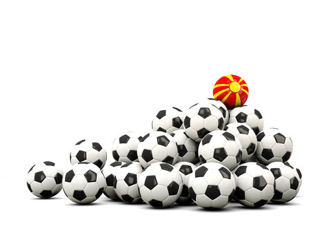 Pile of soccer balls with flag of macedonia