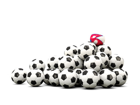 Pile of soccer balls with flag of nepal