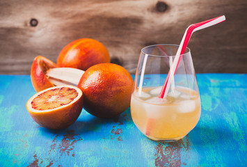 Fresh squeezed orange juice coctail and blood oranges