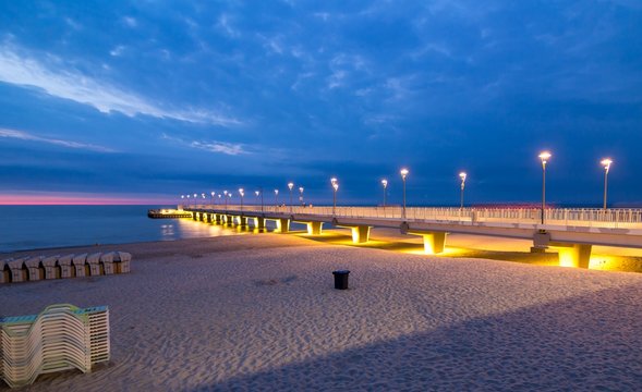 Colorful lights on the pier in the evening, Kolobrzeg, Poland