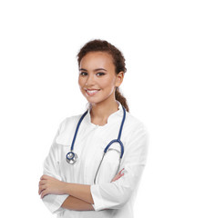 Beautiful African American female doctor on white background