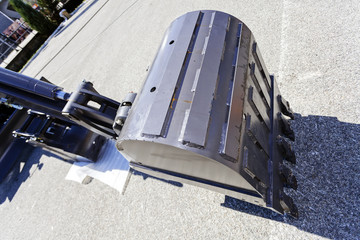 Excavator digging scoop