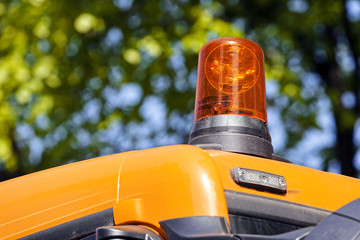 Excavator digging rotating light