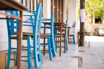 Shady place with table and chairs in the village Pitsidia in the south of Crete. Pitsidia is situated in the south of the Ida mountain range close to Matala. A nice little village and destination