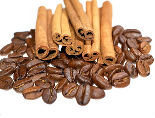 Cinnamon sticks on coffee beans