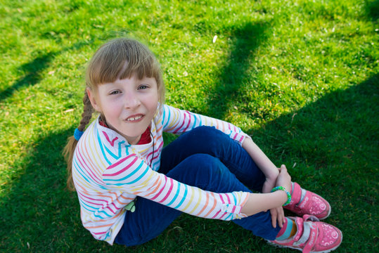 little girl on the grass