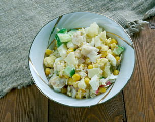 Salad with cod, corn .