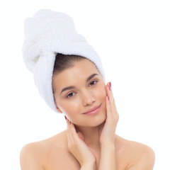 Beautiful natural girl woman after cosmetic procedures, face-lift. Beautiful woman with a towel on his head. 
