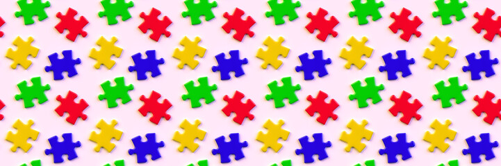 red, yellow, green and blue jigsaw puzzle pieces on a surface (seamless, format 3x1)