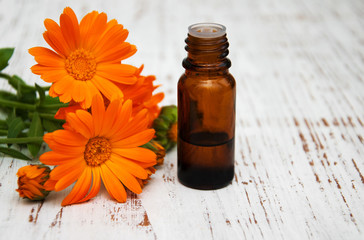 calendula flowers and massage oil