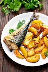 Baked potato wedges and mackerel fish