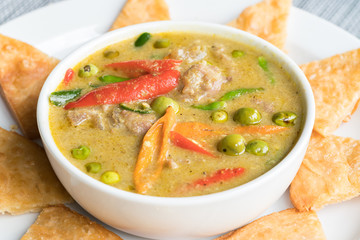 Green Beef Curry traditional Thai Food served with Roti Halal Food in Thailand
