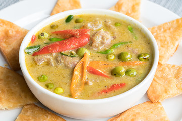 Green Beef Curry traditional Thai Food served with Roti Halal Food in Thailand
