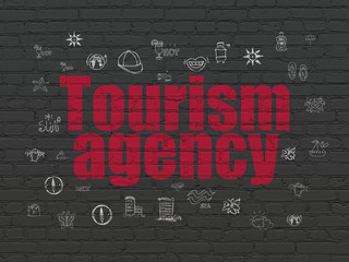 Tourism concept: Tourism Agency on wall background