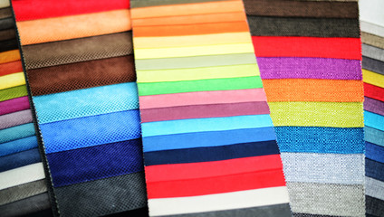 Fototapeta na wymiar Group of multicolored fabrics