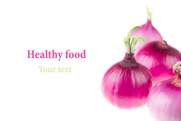 Group pink onion on a white background. Several peeled shiny onion. Isolated. Food background.