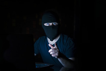 Online criminal in mask