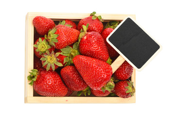 Strawberry in wooden box with price sign