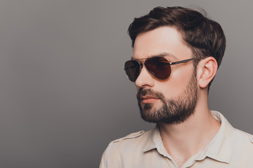 Fototapeta premium Portrait of brutal young bearded sexy man in spectacles