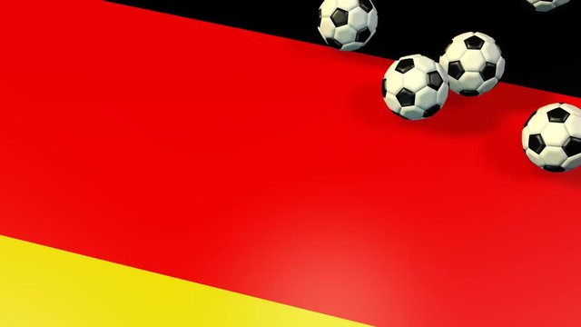 Fu&szlig;ball fallen auf deutsche Fahne