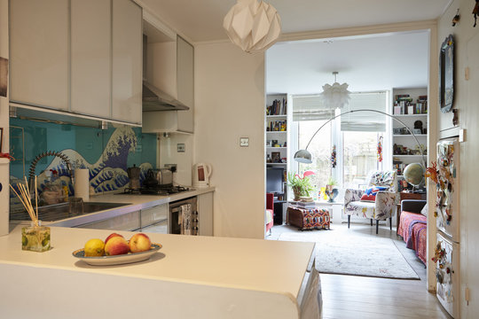 Interior Of Stylish Apartment Showing Lounge And Kitchen