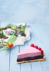 Raspberry tart on a blue background