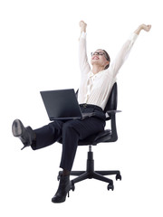 joyful businesswoman sitting on an office chair
