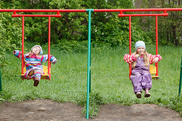 Little girls laughing in the Playground