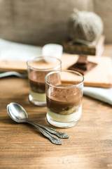 three-layered mousse dessert : chocolate , banana and vanilla