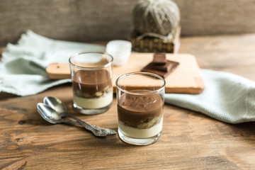 three-layered mousse dessert : chocolate , banana and vanilla