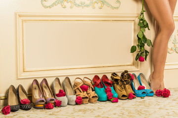 Different female shoes on high heels